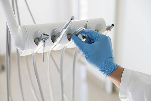 Professional Dental Implants technician working in Newton, KS